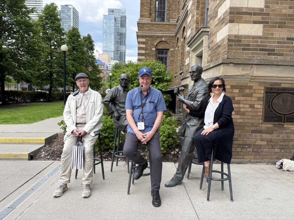 Peter Kopplin, Christopher Rutty, Alison Li at sculpture of Till & McCullough